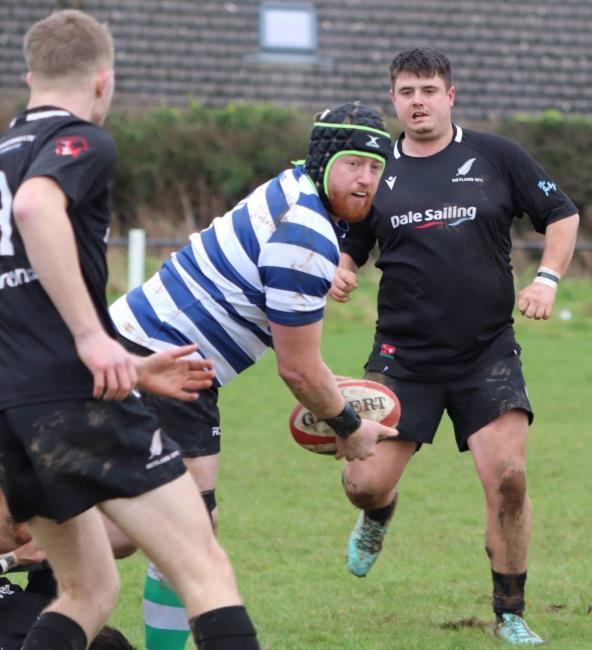 Zac France-Miller involved as George Evans looks on